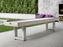 An American Heritage Lanai 9' Outdoor Shuffleboard Table in Pearl White sits on the patio.