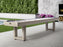 An American Heritage Lanai 12' Outdoor Shuffleboard Table in Oyster Grey sits on a patio.