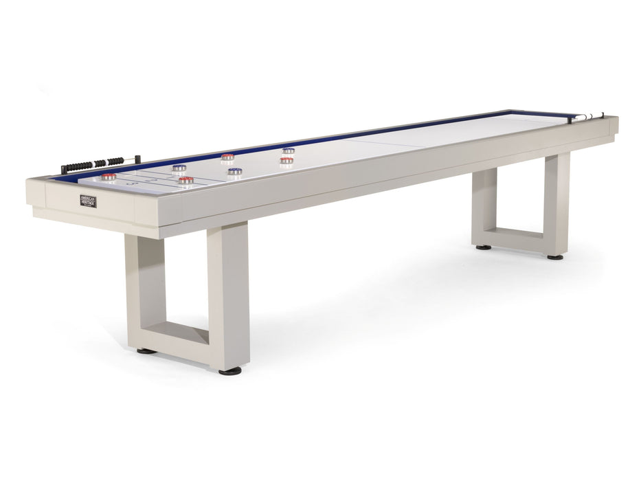 American Heritage Lanai 12' Outdoor Shuffleboard Table in Oyster Grey with blue accents, aluminum legs.