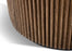 Close-up of a curved wooden slatted furniture piece, showing the natural wood grain and vertical rod pattern against a white background.