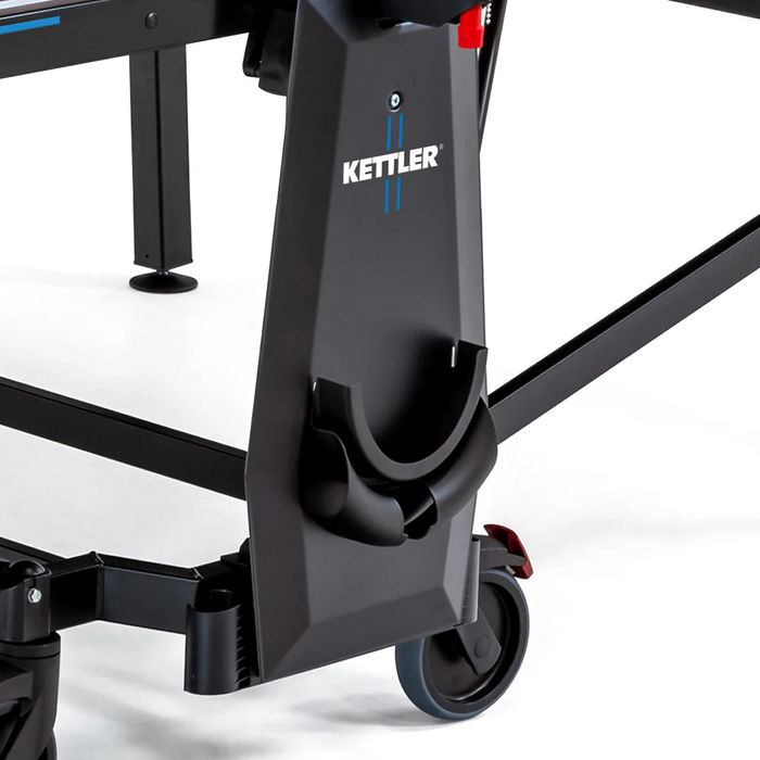 Close-up of Kettler Sedona table leg with wheel and sturdy support structure.