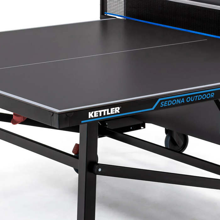 Close-up of the Kettler Sedona Outdoor Table Tennis Table by Kettler with net and composite top.