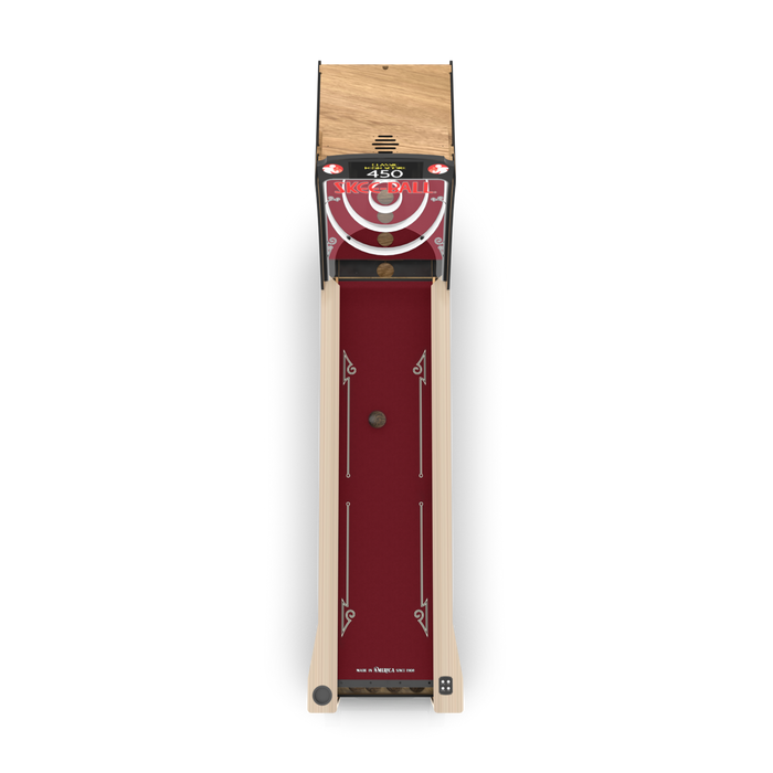 Skee-ball machine with wooden frame and red center on a white background